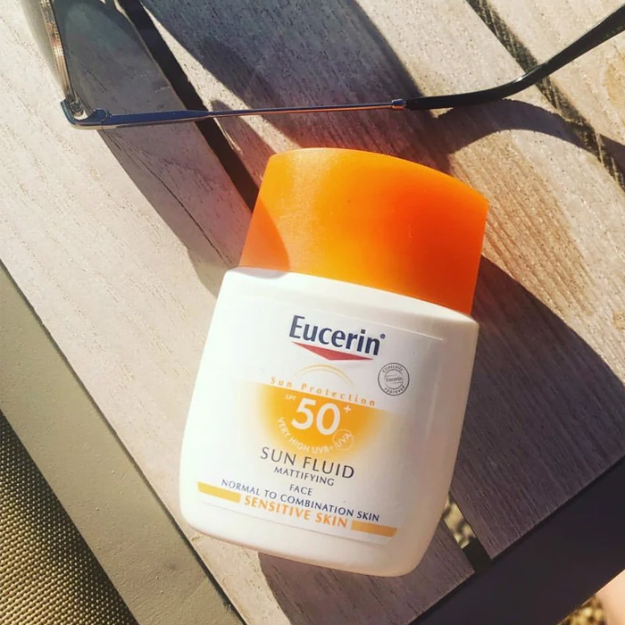 Kem kháng nắng và nóng bảo đảm an toàn domain authority mẫn cảm Eucerin Sun Fluid Mattifying Face SPF 50